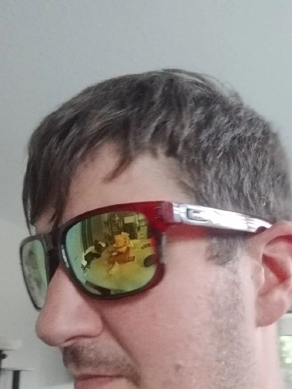 Oakley Men’s Translucent Red Holbrook Sunglasses with Green Mirrored Lenses
